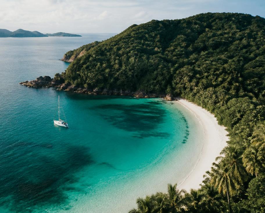 A secluded tropical bay with turquoise water and white sand